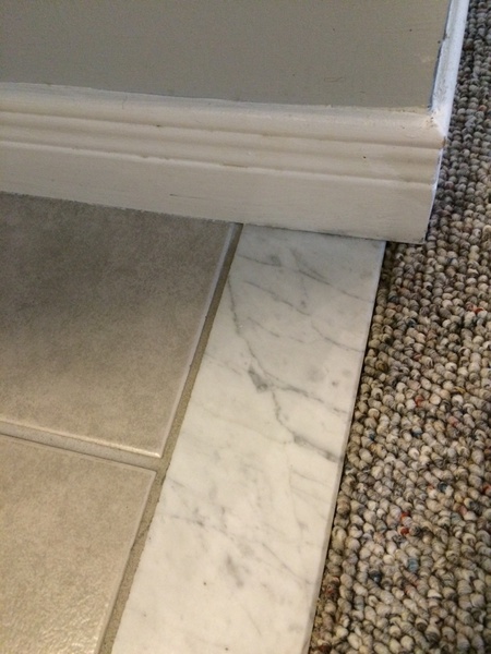 Concrete Versus Marble Thresholds, How To Install A Threshold On Tile Floor